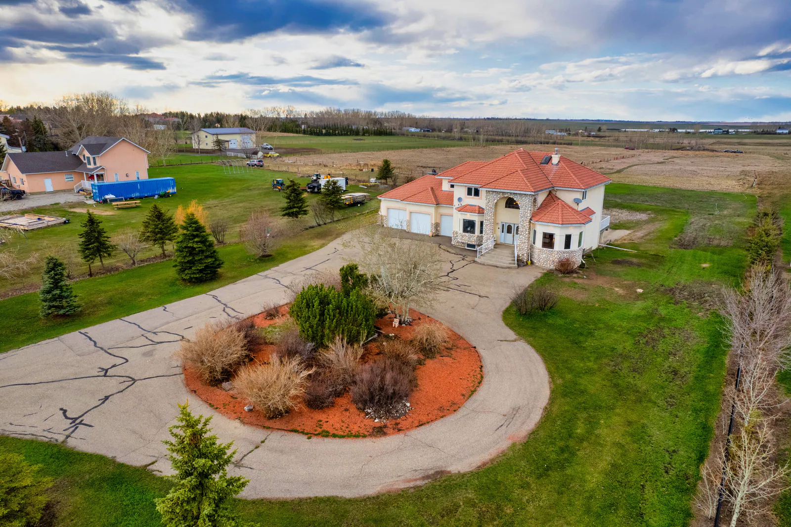 Wider aerial with surrounding acreages near Chestermere