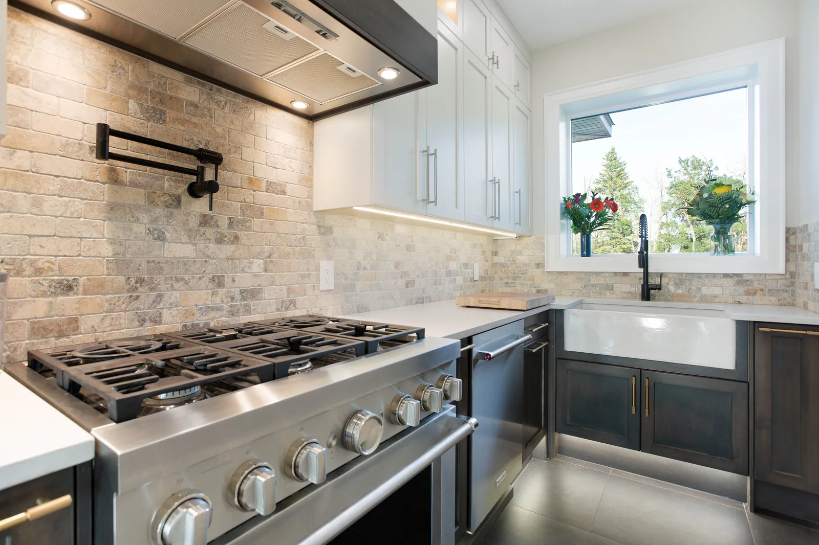 Galley kitchen with dual-fuel range and quartz