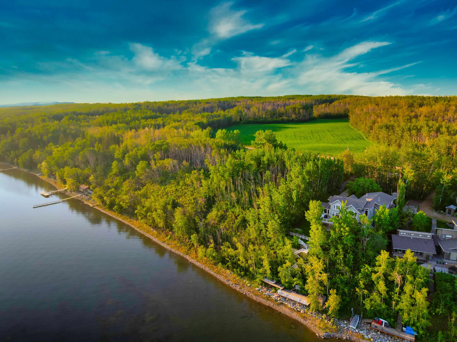 Wide aerial of Sylvan Lake and the Blissful Beach shoreline