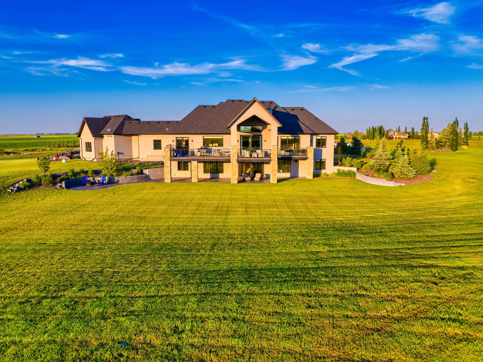 Rear walkout elevation across the lawn