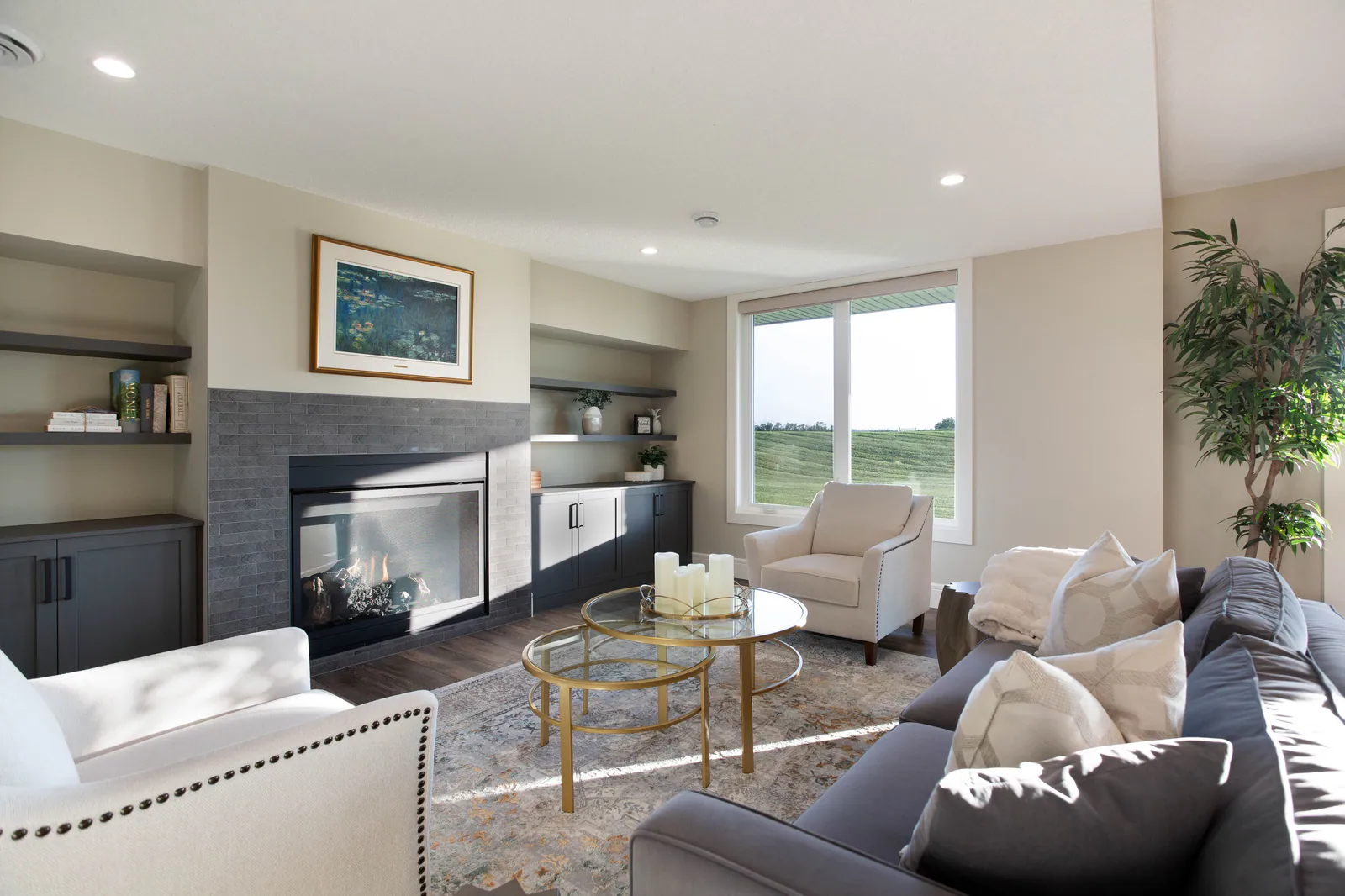 Walkout lower-level lounge with fireplace